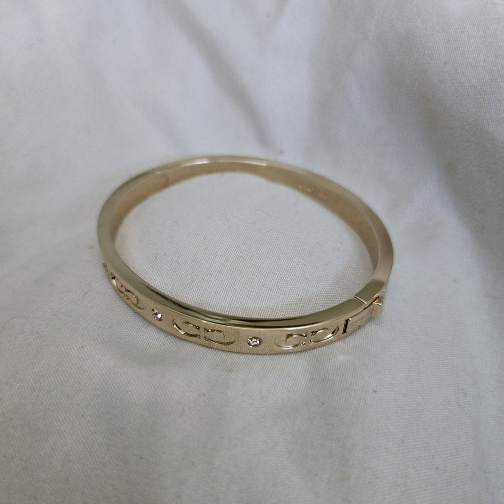 Elegant Gold Bangle Bracelet - Picture 2 of 4